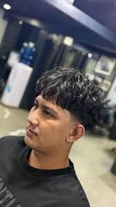 Những kiểu tóc nam giúp che tai to
